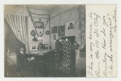 Ignatius Bjorles in his dorm postcard