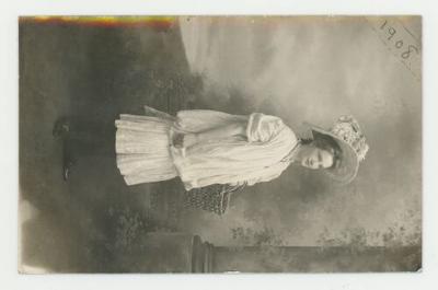 Young woman in a dress postcard