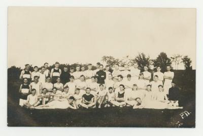 St. Olaf College men's track and field team in a field postcard