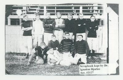 St. Olaf College senior football players posing postcard