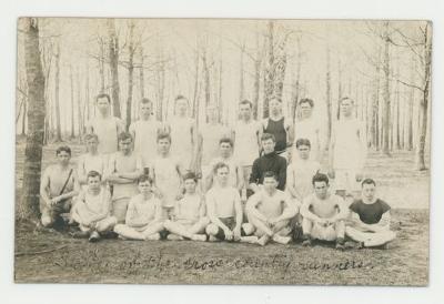 St. Olaf College men's cross country team in the woods postcard