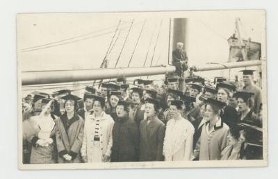 Choir group singing on a boat postcard