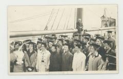 Choir group singing on a boat postcard