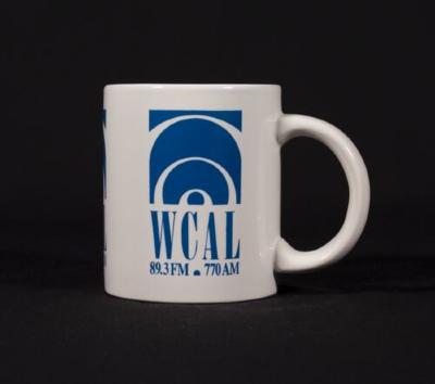 White, blue, and teal WCAL mug