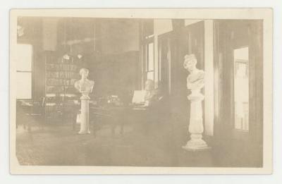 Stone busts in Steensland Library postcard